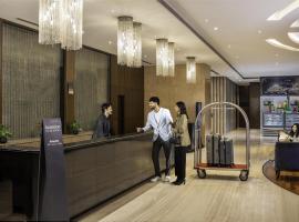 古尔冈优迪格豪尔丽筠酒店，位于古尔冈的酒店