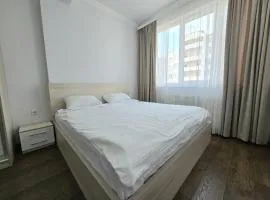 King-size bed and living room apartment