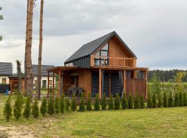 Domek pod lasem - Nowa stodoła，位于Ożenna的酒店