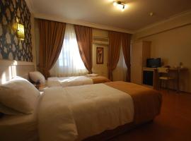 迷你酒店，位于伊兹密尔巴兹曼区的酒店