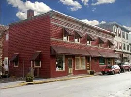 麦恩套房酒店