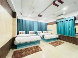 hotel city point，位于加姆布的酒店