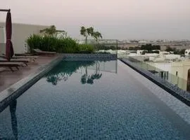 The Glance inn Udaipur by NAINA STAYCATION - Rooftop swimming pool ! prime location ! most awarded ! big parking !