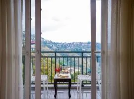 Alaya Stays Cliff Vallis 3-BHK Hill View Apartment with Balcony & Common Play Zone