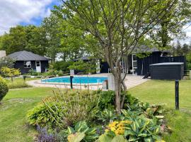 Aneks i rolige omgivelser-adgang til pool og sauna，位于奥卢姆的别墅