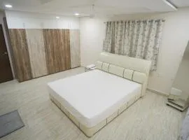 Stay Pride Service Apartments - AC Rooms in Vijayawada - Family & Business Stays