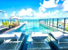 Flat Vista Mar Apenas 50 metros da praia，位于若昂佩索阿的酒店