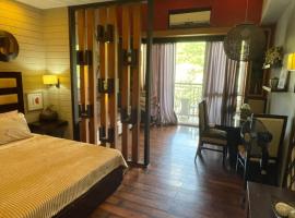 Pico De Loro Miranda B With 290 mbps Wifi，位于纳苏格布的公寓式酒店