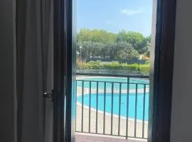 Casa Origine, appartamento vista piscina, al mare