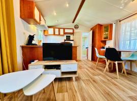 O'PARADIS - Mobil-home au calme, clim, BBQ & piscine，位于莱马特的酒店