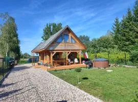 Pokój w domku z bala w Suszczy