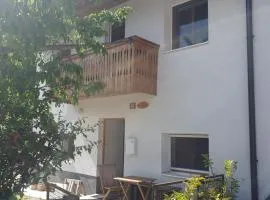 ALPINE VILLAGE APARTMENT with a private terrace, garden, and parking - at a walking distance from LAKE BLED