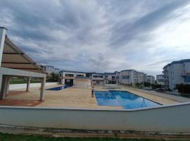 Apartamento hogar para compartir con 3 habitaciones 3 piscinas, turco, sauna, gym y más en Restrepo Meta，位于雷斯特雷波的酒店