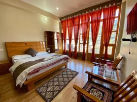 Hotel Mansarovar Inn，位于Munsyari的酒店
