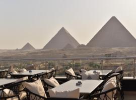 Neom Pyramids Valley Boutique hotel，位于开罗的豪华酒店