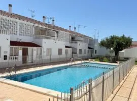 Bungalow with a pool and a terrace