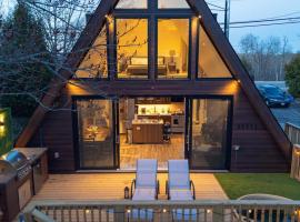 A-frame with Sauna, Hot tub and BBQ，位于MacTier的酒店