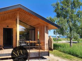 WerderChalet -- SEABREEZE -- Meerblick I Strand 150m I Sauna I eKamin I 2 Personen und Kind I by "Meyers am Meer"，位于博伊恩斯多夫的木屋