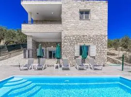 Elysian Stone Villa with Pool & Mountain View