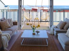 Penthouse over the harbour，位于Skillinge的酒店