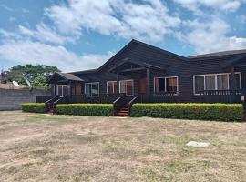 Villas Cabañas Palmerola，位于科马亚瓜的酒店