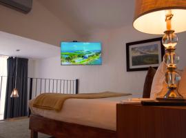 Hotel Boutique Camino Del Bosque，位于乔卢拉普埃布拉机场 - PBC附近的酒店