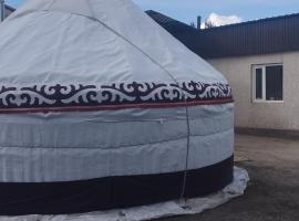 Гостевой дом Улар，位于Tamga的酒店