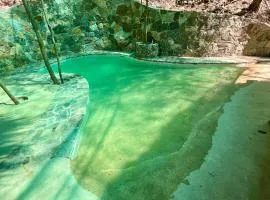 Habitaciones en casa De los árboles en la playa con alberca