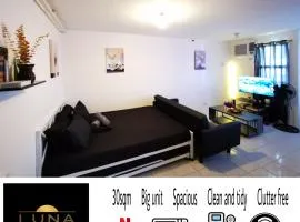 Luna staycation Cozy Condo near Enchanted Kingdom