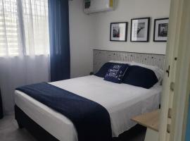 Habitacion con sulay a 10 minutos del aeropuerto punta del este tocumen，位于El Quije的民宿