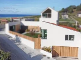 Casita con jardín en playa de Razo