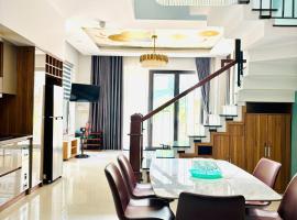 Sunrise Homestay，位于岘港的木屋