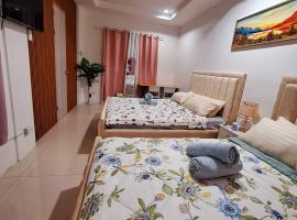 A1 1 Bedroom 2 Queen Size Beds Apartment Transient House near USEP Obrero Abreeza Mall，位于达沃市的酒店