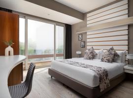 The Atara Near Golf Course Road，位于古尔冈的酒店