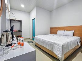 Guest House Hamz Syariah Redpartner，位于Kumprung的酒店