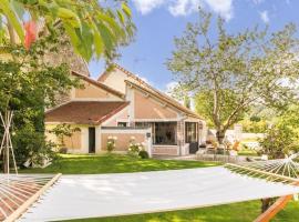 La Petite Maison de Giverny - Chambres privées - Gîte 5 étoiles au Cœur du village，位于吉维尼的酒店