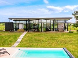 La Casa de Cristal by Puerto Dijama，位于卡梅隆的酒店