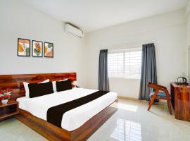 Super Townhouse Hebbal Dasarahalli Formerly Otium Suites，位于班加罗尔Kempegowda International Airport - BLR附近的酒店