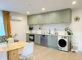 Free parking a fully renovated century old building, just a 5 minute drive to the city center Unit 4