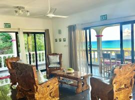 Vilea Frangipani Ground Floor 2 bedroom Apartment，位于马埃岛的酒店
