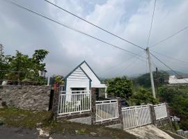 Uthe House，位于Pacet的酒店