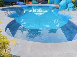 Tanjong Tinggi Cottage，位于Sijuk的酒店