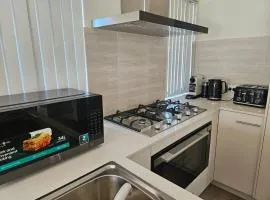 Cozy and Compact Holiday and Business Home