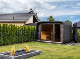 Ferienhaus am See mit Sauna，位于Barßel的酒店