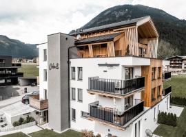 Cabin8 Alpine Flair Apartments，位于佩尔蒂绍的公寓
