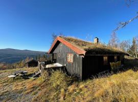 Thorpeset cabin by Norgesbooking - cabin with amazing view，位于Uvdal的酒店