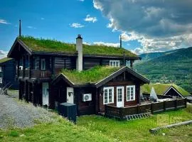 Stylish log cabin in Hafjell with view & sauna