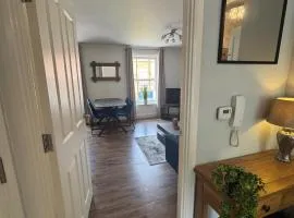 Town centre abode with gated parking