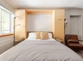 Super-Efficient Studio with Full Kitchen Balcony & Smart Sleeping Options