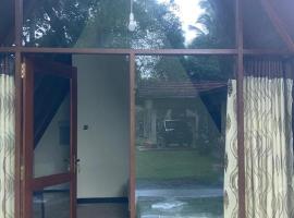 Coco Breeze Cabanas，位于Nikawatawana的酒店